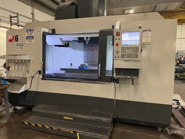 Haas #VF-6/50, CNC vertical machining center, 64" X, 32" Y, 30" Z, 64" x 28" table, 30 HP, 7,500 RPM, CT50