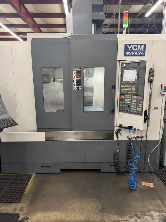 YCM #NSV102A, CNC vertical machining center, 40.1" X, 23.6" Y, 23.6" Z, 44.16" x 25.59" table, 30 HP, 15000