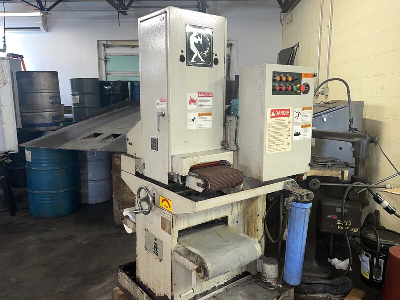 9" x 60" Timesavers #960-1MW, wet belt grinder, 8-3/4" max part width, coolant w/paper filter, 5 HP, 230 V.