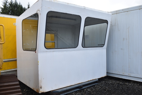 Insulated Operators Control Cab, diamond plate floor, swing entry door, one opening window, lights & outlets