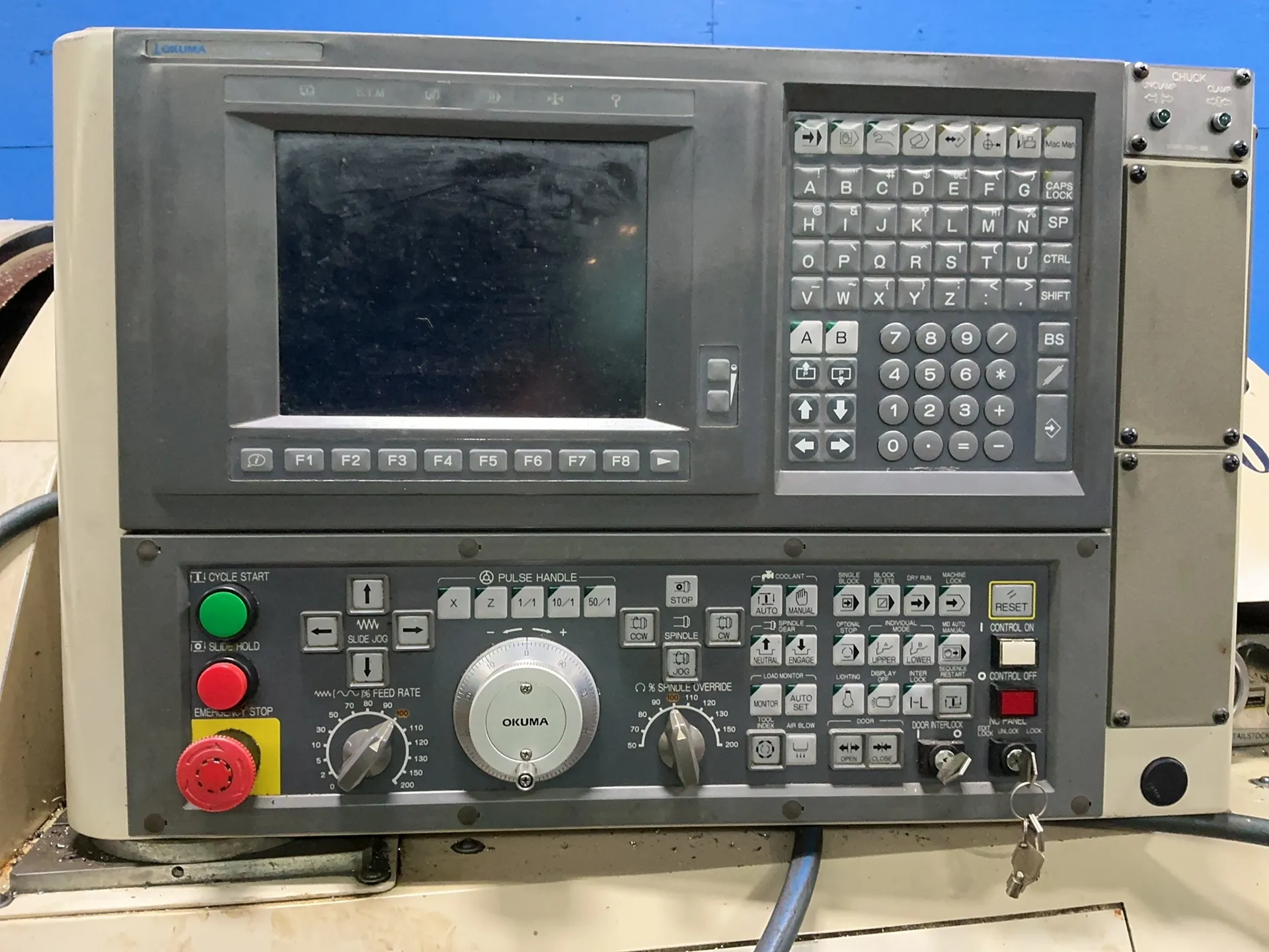 Okuma #769-S, CNC Lathe, Kitagawa 10" Three Jaw Chuck, 3.25" Bore, Tail Stock, OSP-U10L Control, Chip Conv.