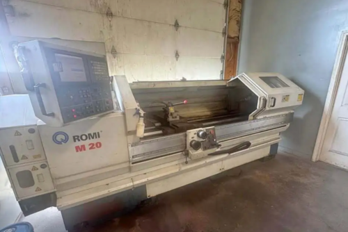 Romi #M20, CNC Lathe, 11.02" X, 80" Z, 20" swing over bed, 80" between centers, 12" chuck, 3" bar, 15 HP