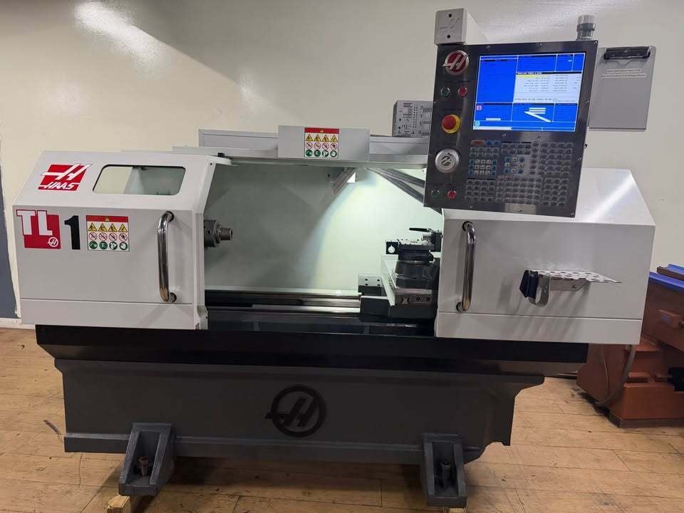 Haas #TL-1, CNC Lathe, 8" X, 30" Z, 20" swing, 16" max. cutting diameter, 30" between centers, 8" chuck, 2.3"