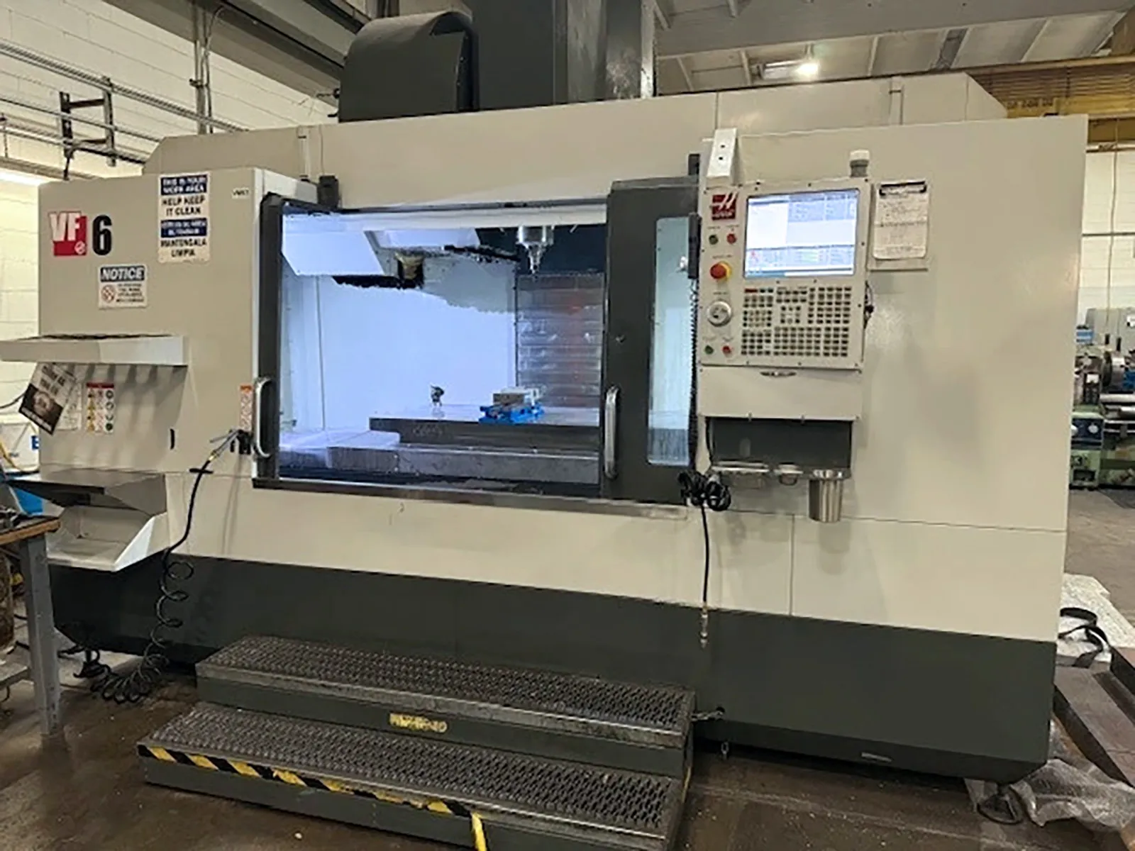 Haas #VF-6/50, CNC vertical machining center, 30 automatic tool changer, 64" X, 32" Y, 30" Z, 7500 RPM, 30