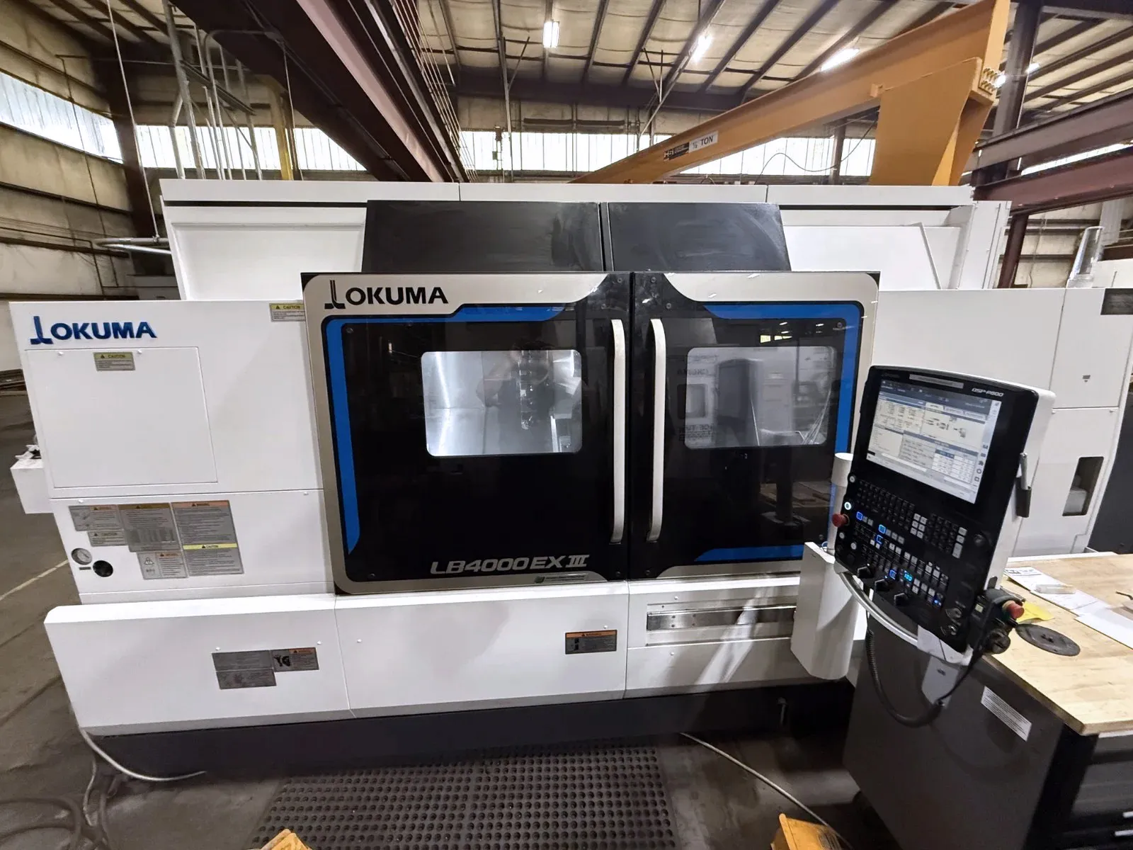 Okuma #LB4000-EX-III-1500-MY, CNC turning center, 26.3" swing, 18.9" turning diameter, 4.4" bar, 12" chuck