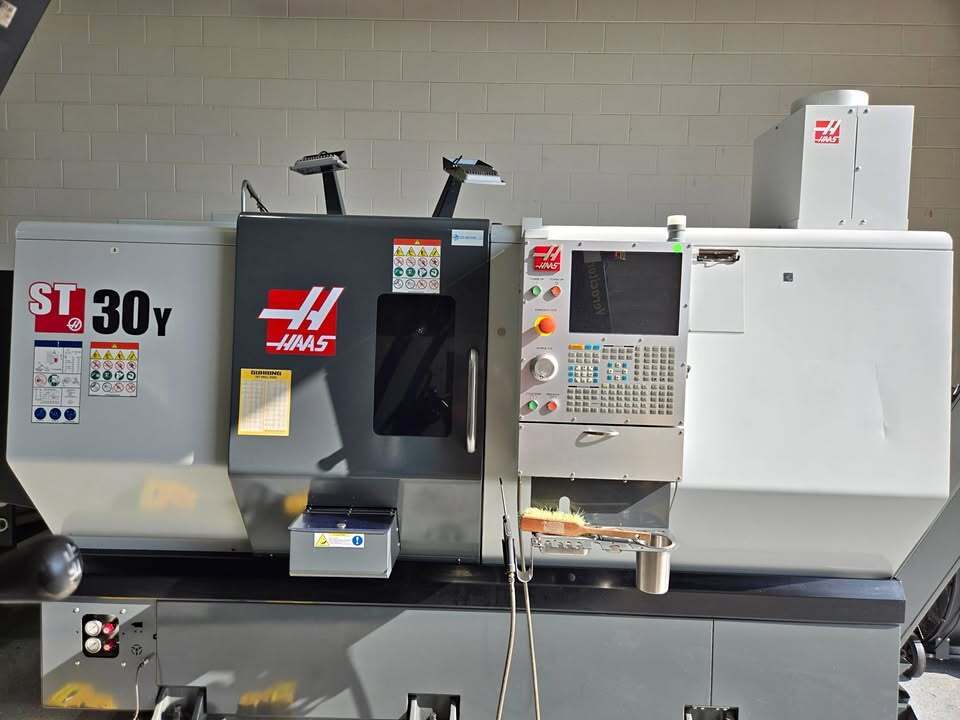 Haas #ST-30Y, 4-Axis CNC Lathe, 31.7" swing, 23" machining length, 18" turning diameter, 10" chuck, 3" bar