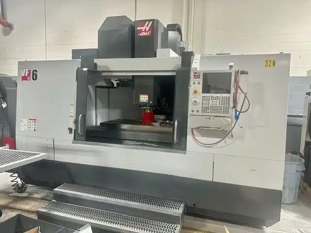 Haas #VF-6/50, CNC vertical machining center, 64" X, 32" Y, 30" Z, 7500 RPM, 30 automatic tool changer, 1000