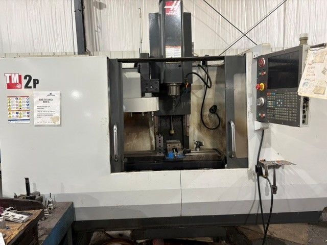 Haas #TM-2P, CNC vertical machining center, 10 automatic tool changer, 40" X, 16" Y, 16" Z, 6000 RPM, #40