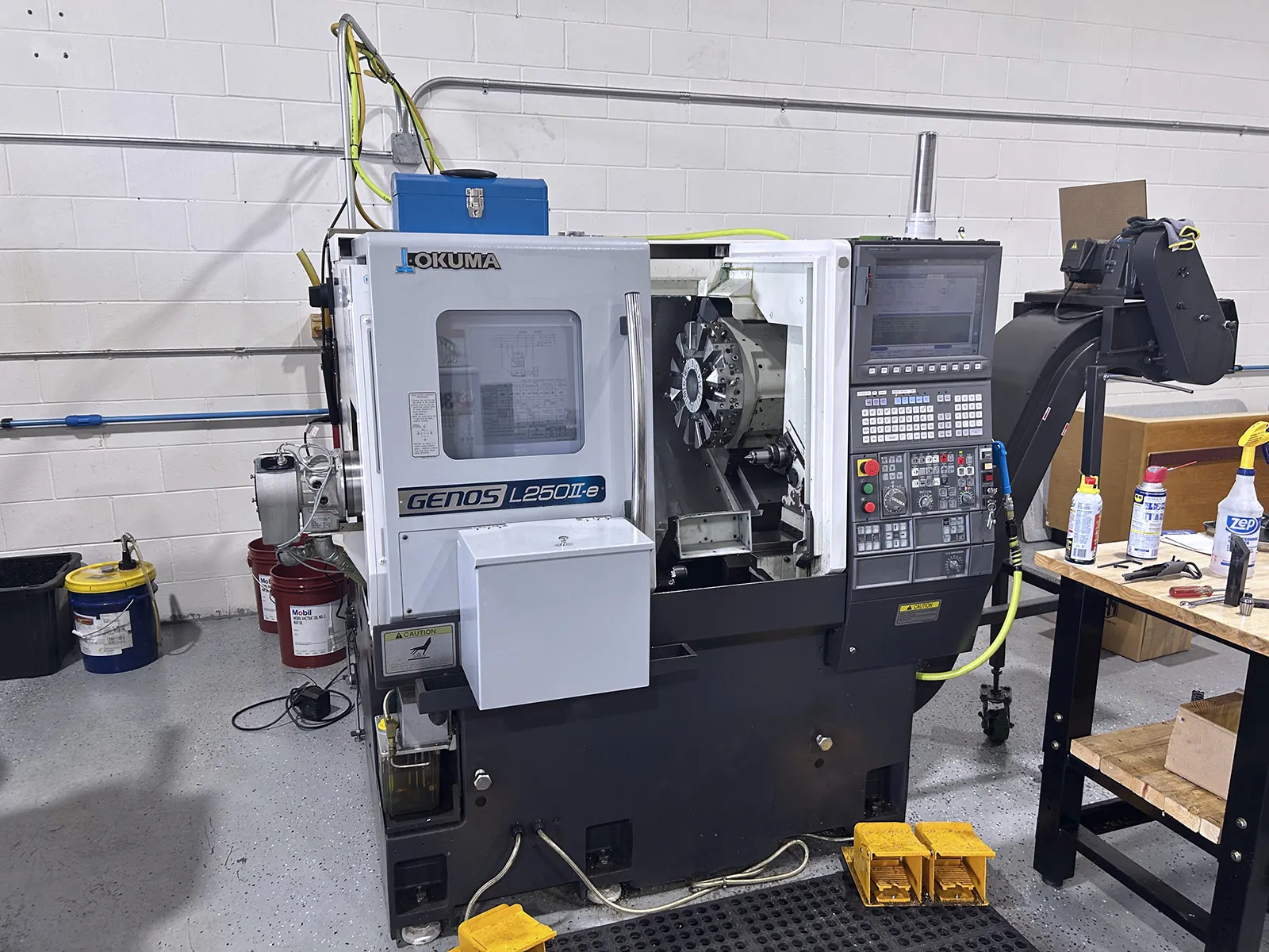Okuma #Genos-L250II-e, CNC lathe, 17.7" swing, 8" chuck, 2" bar, 11.5" centers, 11.02" diameter, 4500 RPM, 15