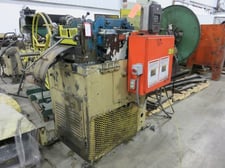 12" x .03" Littell #212-17PD, 17-roll straightener, entry & exit pinch rolls, photo eye loop control, lube