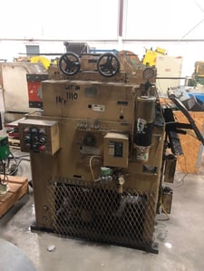 12" x .03" Littell #212-17PD, 17-roll straightener, entry & exit pinch rolls, photo eye loop control, lube