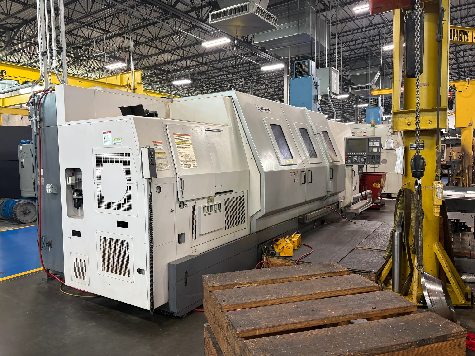 Okuma #LB-45II, CNC Lathe, 33.8" swing, 25.9" turning diameter, 120" centers, 24" chuck, 6.5" bar, 50 HP