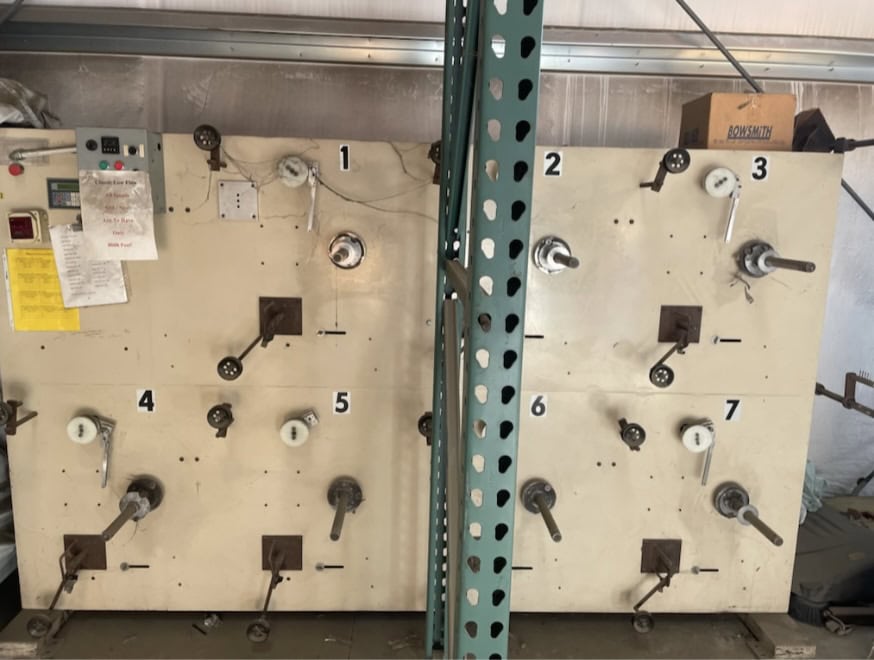 r & s machinery & design 7-station, double deck, 12" traverse, 16" spool flange O.D., 8" barrel O.D., 1-1/4"