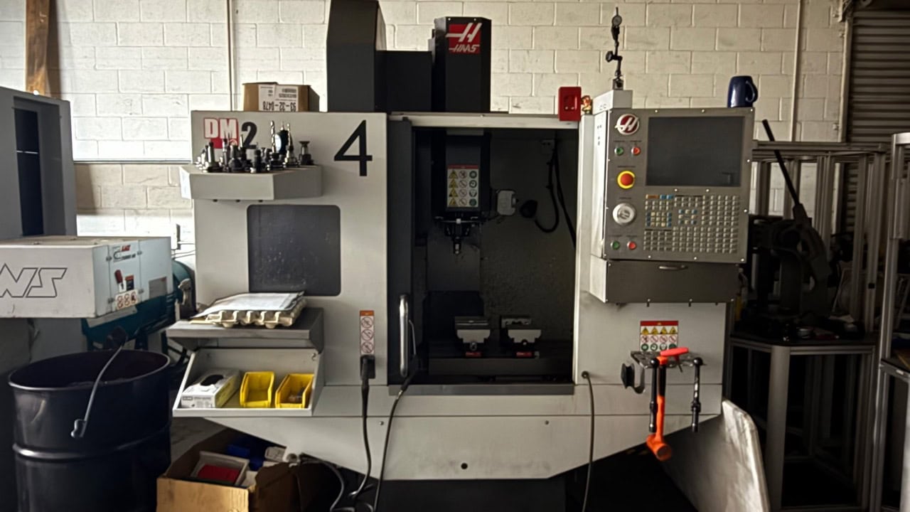 Haas #DM-2, CNC vertical machining center, 28" X, 16" Y, 15.5" Z, 34" x 15" table, 10,000 RPM, CAT 40, 15 HP