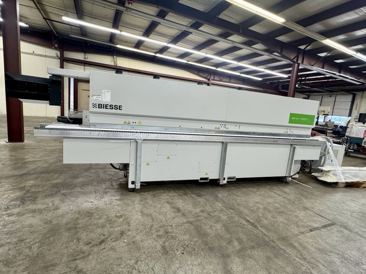 Biesse #Akron-1330-A, automatic single sided edgebander, pre-mill, corner rounding, scraping, buffing