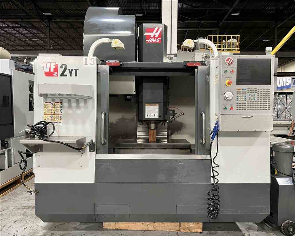 Haas #VF-2YT, CNC vertical machining center, 40 automatic tool changer, 30" X, 20" Y, 20" Z, 8100 RPM, 30 HP