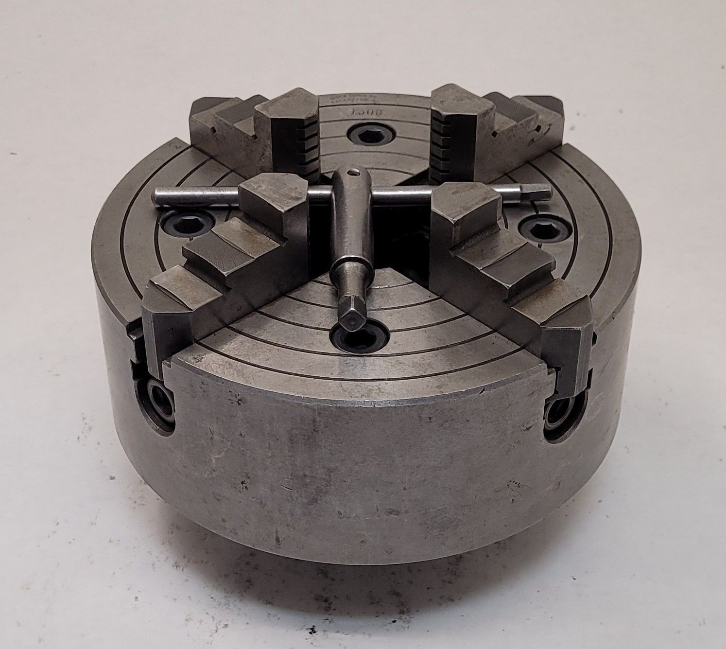 8" Buck #1308, 4-jaw lathe chuck, D1-4 Camlock back, 2" thru hole, 1800 RPM, w/ chuck key
