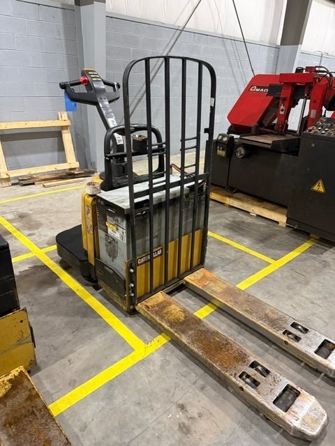 6,000 LB Caterpillar Towmotor, walk behind electric pallet lifter, 49" forks, 24 V. industrial battery (2
