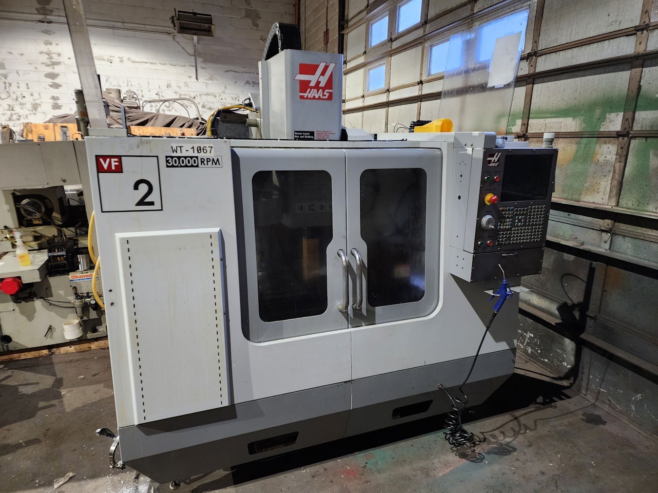 Haas #VF-2D, 4 Axis CNC vertical machining center, 30,000 RPM, 20 automatic tool changer, 20 HP, BT30, probe