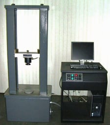 24000 lbf. Tinius Olsen #LoCap Electro-Mech tension & compression testing machine