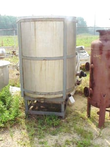 375 gallon Alsop Engineering Stainless Steel storage tank in Carbon Steel frame, last used in
