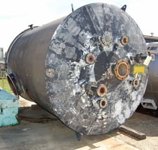 3500 gallon Stainless Steel tank, 8' dia. x 10' ht., flat bottom, dome top, openings on top: (5) 4", (1) 6"