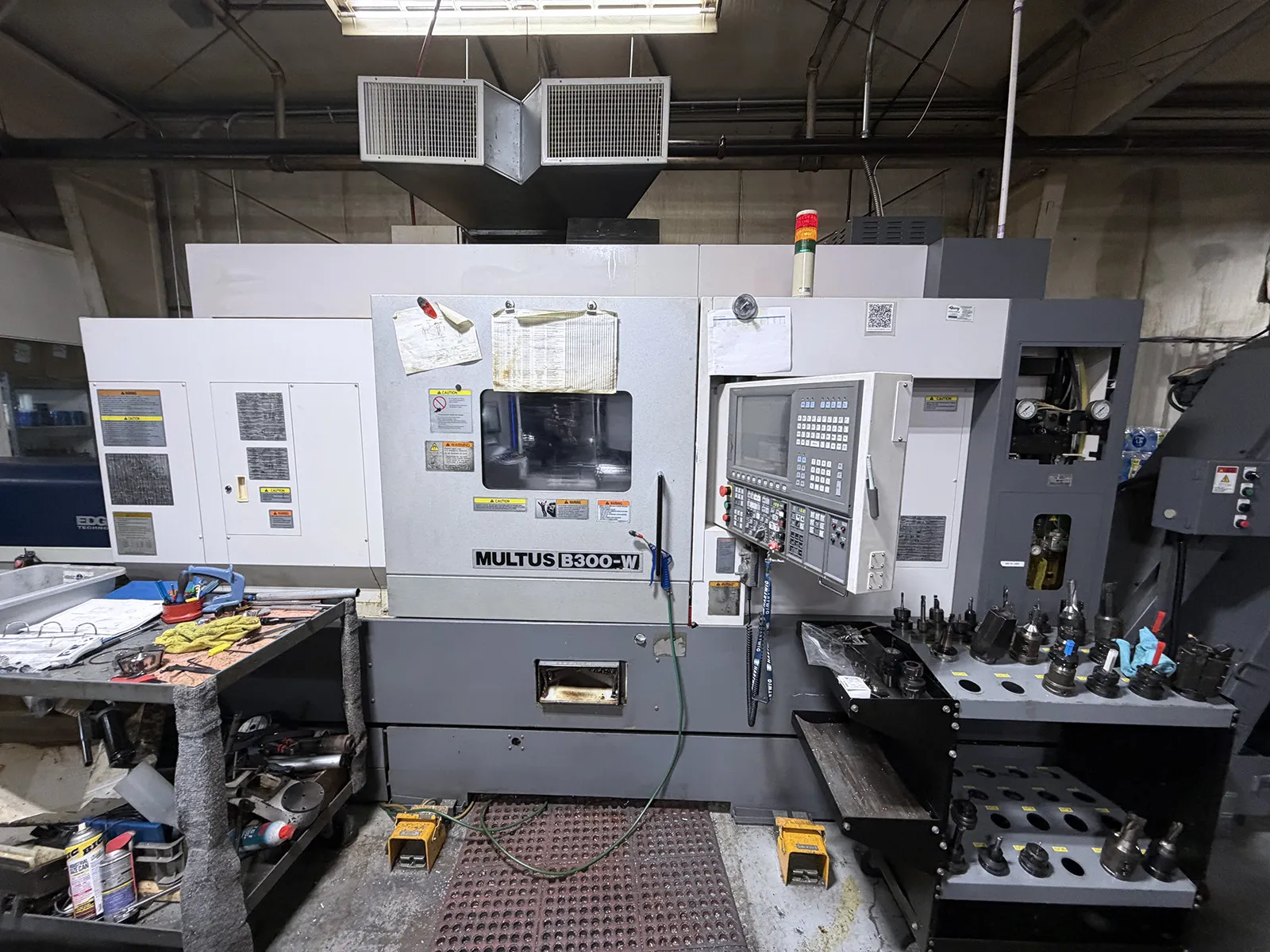 Okuma #Multus-B300-W, 5" axis CNC turning center, 23.6" swing, 16.9" turning diameter, 3" bar, 41.34"