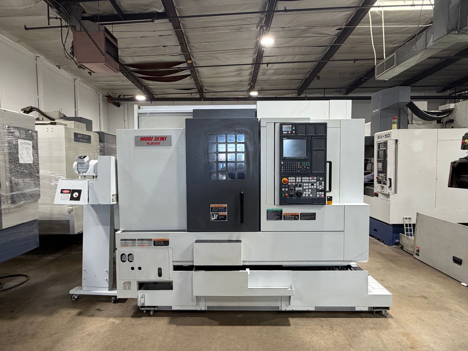 Mori Seiki #NL-2000SY/500, CNC lathe, 36.4" swing, 8" chuck, 2.5" bar, 14.4" dia., 20" lgth, 20/15 HP, 5000