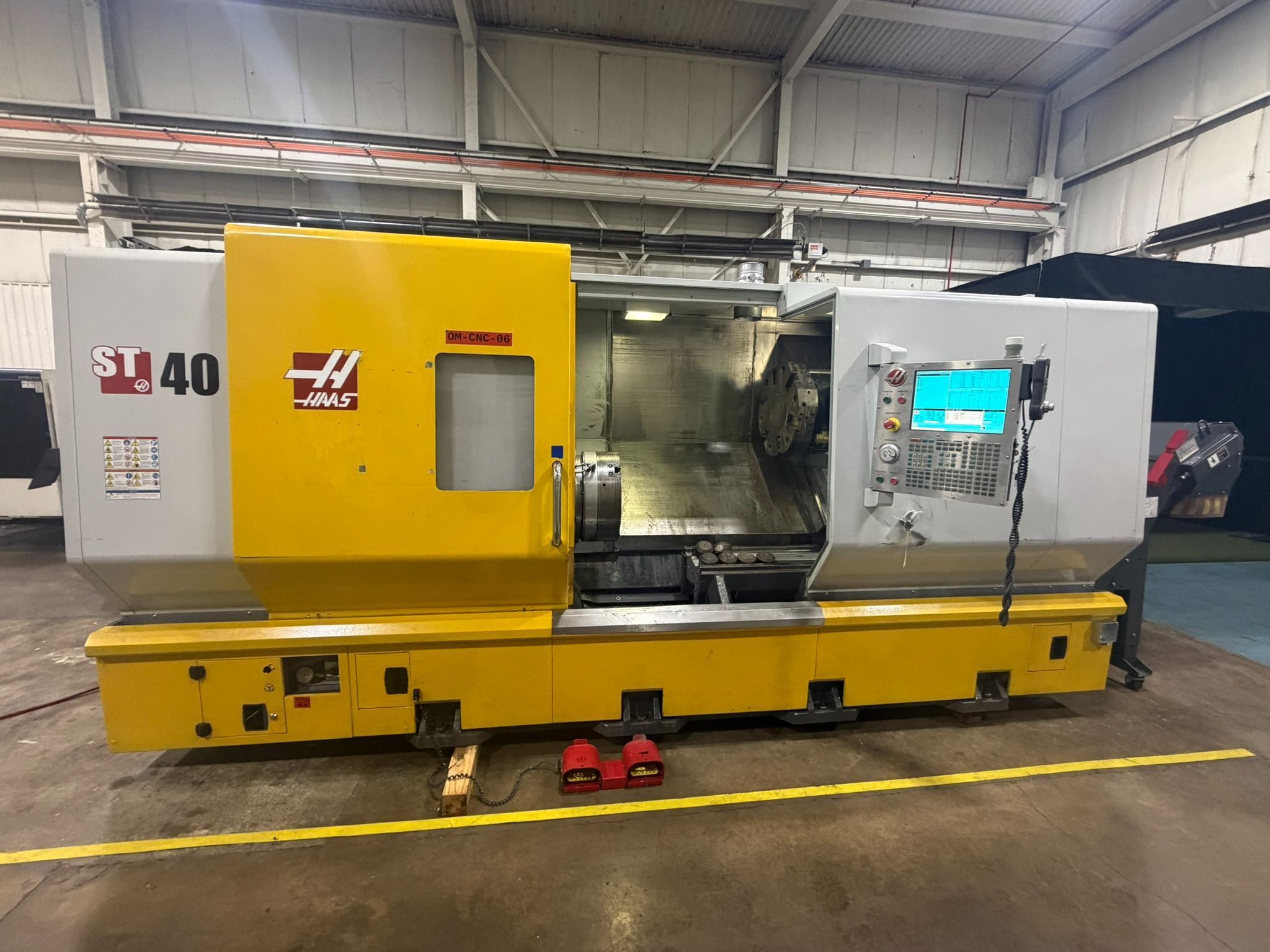 Haas #ST-40, 2-Axis CNC Turning Center, 17" X, 44" Z, 34.5" swing, 25.5" turning diameter, 44" machining
