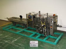 Jones #CMV6, semi-automatic, continuous motion, vertical, hot melt glue cartoner rated from 40-120 cartons