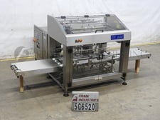 OK International #200, bag former / inserter - cuts, inserts and cuffs bags from a roll of gusseted