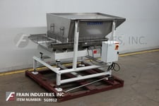 Smalley #EMC2+, Stainless Steel vibratory feeder with a 72" L x 48" W x 25" D Stainless Steel product hopper