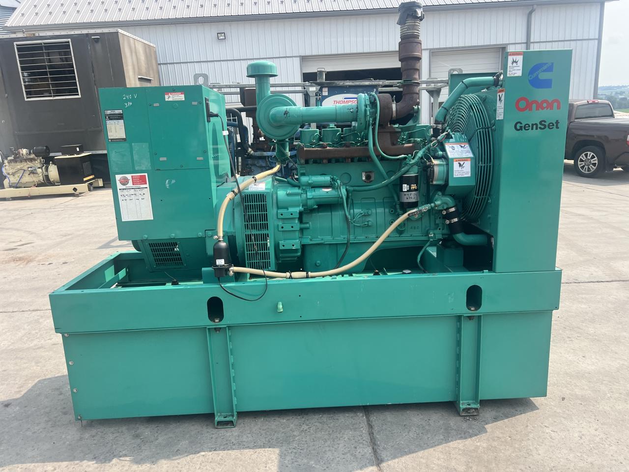 80 KW Cummins/Onan #80DGDA, diesel generator set, 240 Volts, 1/3 phase, 5.9L Cummins engine, open skid, base