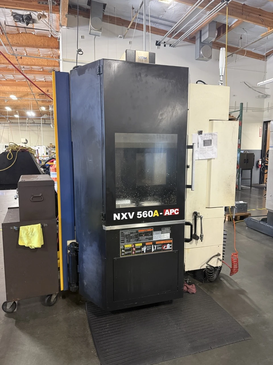 YCM #NXV560A-APC, CNC Vertical Machining Center, 22" X, 16.1" Y, 17.7" Z, 22.05" x 16.14" table, 25 HP