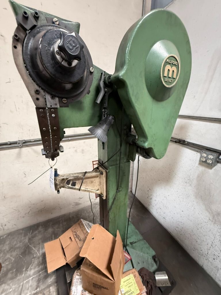 Milford #305-Rev-1, pedestal riveting machine, tooled for 857 x 187 rivets, rigid cast frame
