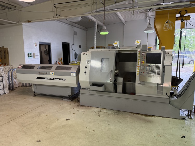 Haas #SL-20T, CNC turning center, 20" swing, 10" turning diameter, 20" centers, 3" bore, 2" bar, 4000 RPM, 20