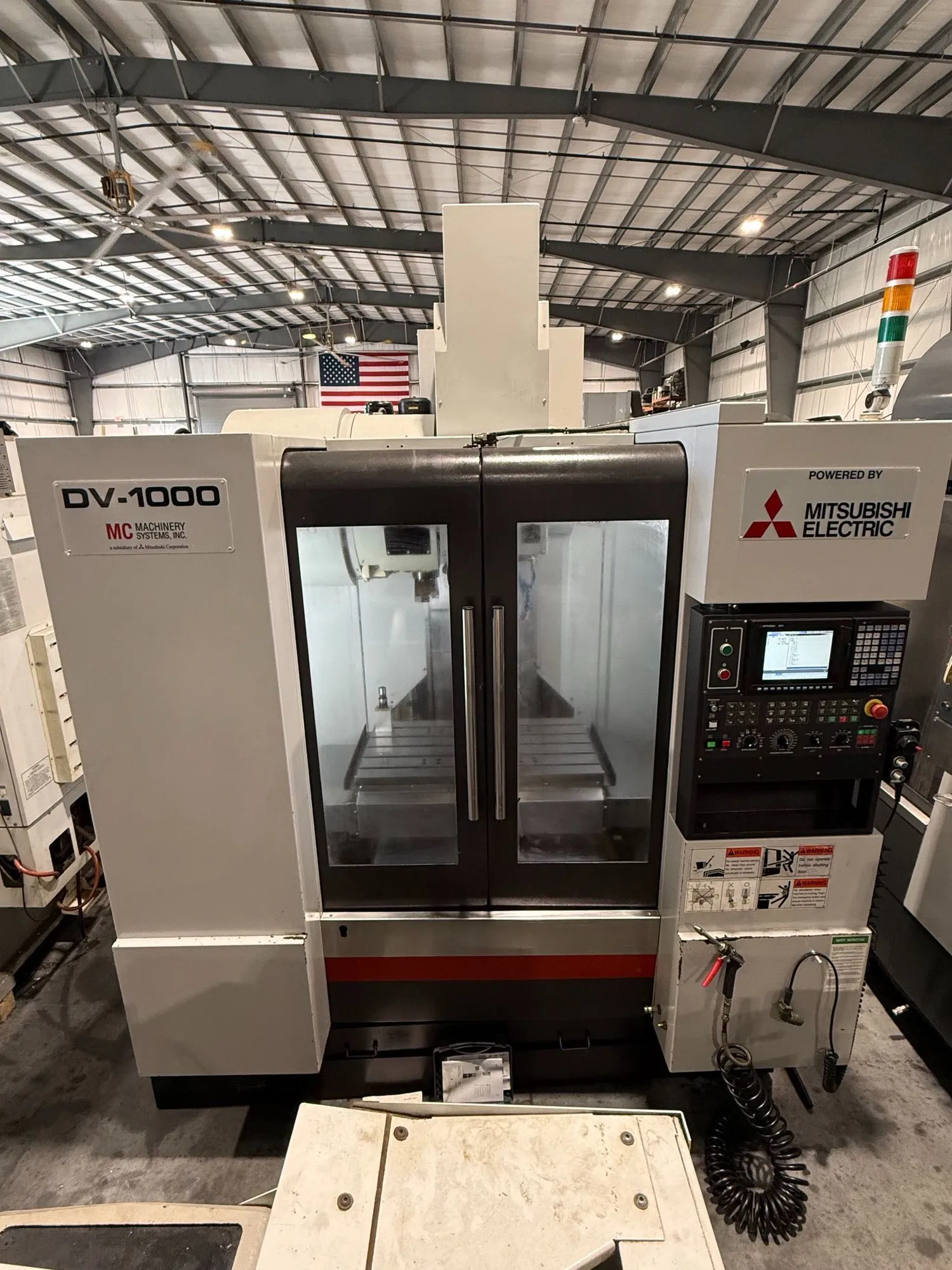 Mitsubishi Litz #DV-1000, CNC vertical machining center, 40.2" X, 22" Y, 23.6" Z, 15000 RPM, CAT-40, 15 HP