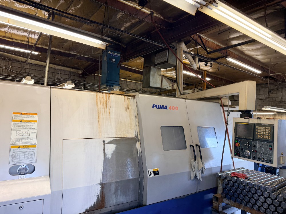 Daewoo Doosan #Puma-400B, CNC lathe, 15" Chuck, 24" swing, 26" Travel, Chip Conveyor