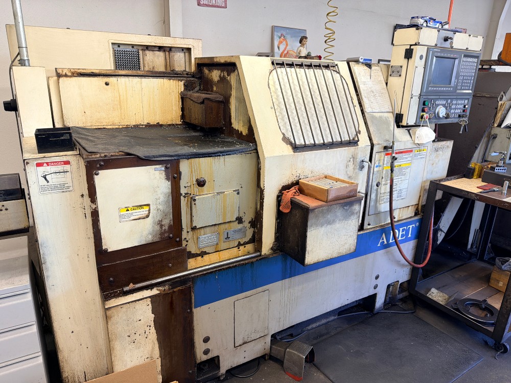Okuma #LNC-8C, CNC lathe, OSP 700L Control, 12 station turret, Kitagawa B-08 3 Jaw Chuck, SMW Omnibar Bar