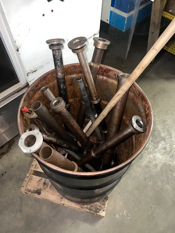 Drum w/ assorted steel spindle bar sleeves