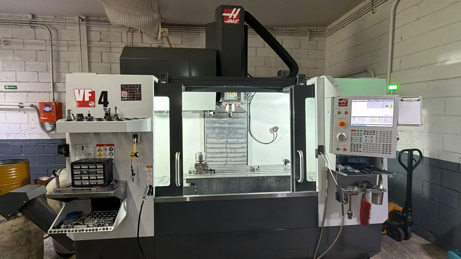 Haas #VF-4, CNC Vertical Machining Center, 50" X, 20" Y, 25" Z, 8100 RPM, CAT 40, 30 automatic tool changer