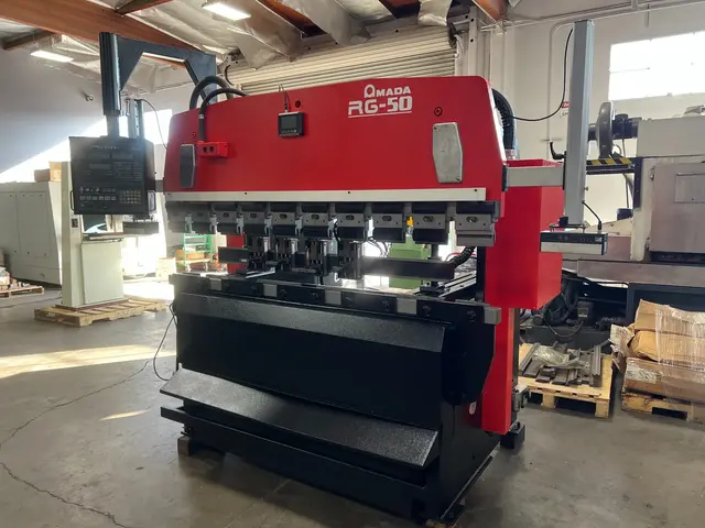 55 Ton, Amada #RG-50, Hydraulic Press Brake, 6.8' overall bed length, 59.84" between housing, 3.9" stroke