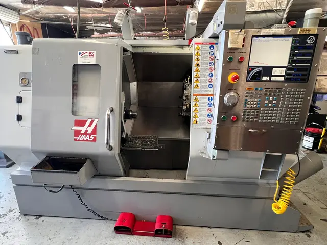 Haas #SL-20T, CNC Lathe, 23" swing, 8" chuck, 2" bar, 10" turning diameter, 4000 RPM, 10 turret station
