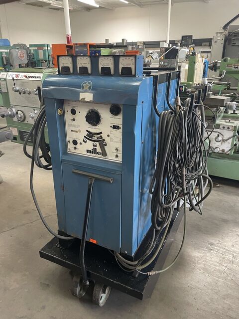Miller #330A/BP, AC/DC TIG and stick welder, 435-465 amp. AC, 460 amp. DC, 850 lb.