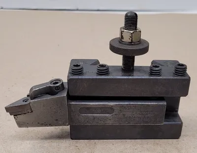 Aloris #CXA-1, quick change tool post holder, w/Kennametal #MVJNR-123B tool holder