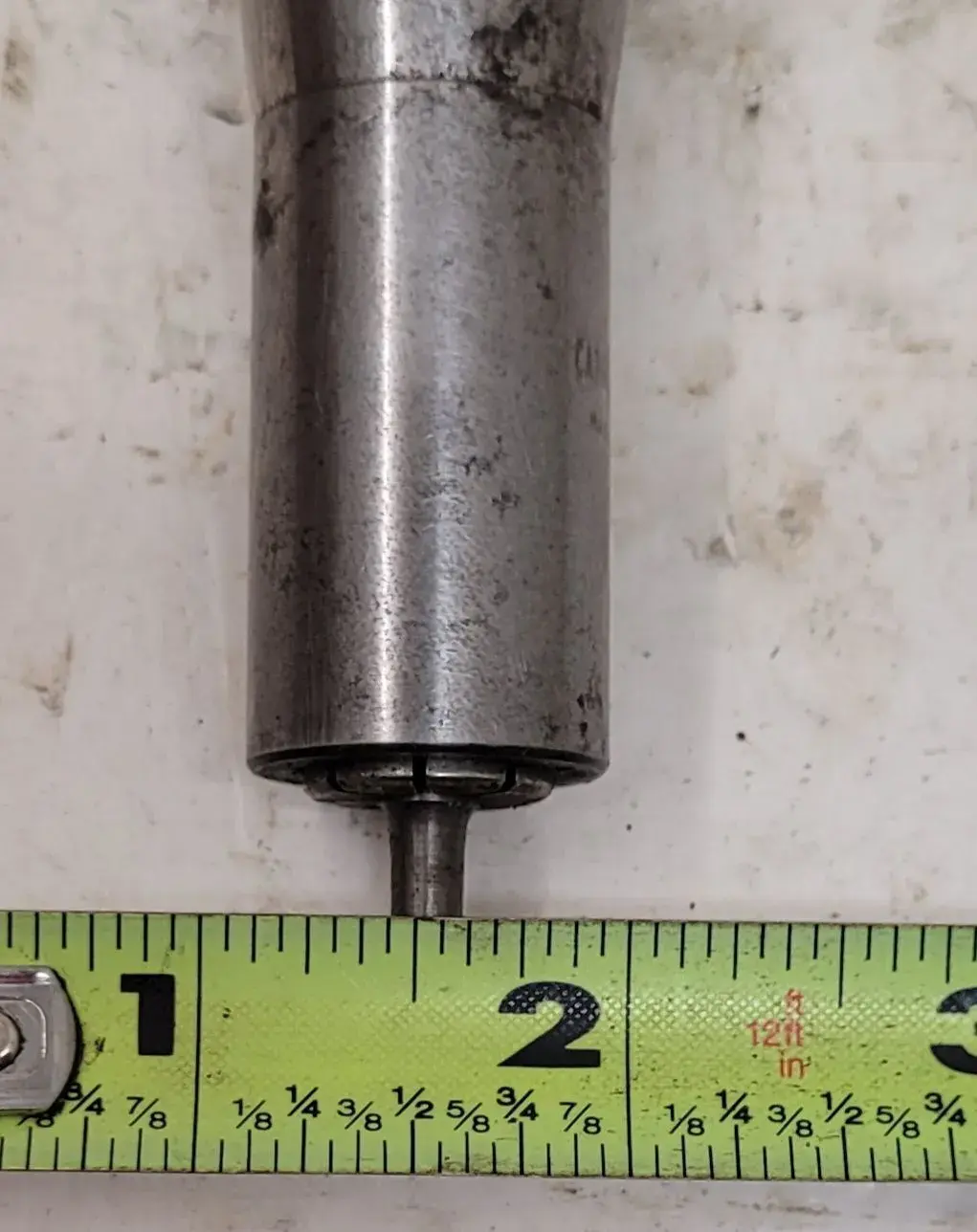 Nikken, CAT 40 collet chuck, 15 mm bore diameter, 43.8 mm max body diameter, 5-5/8" projection