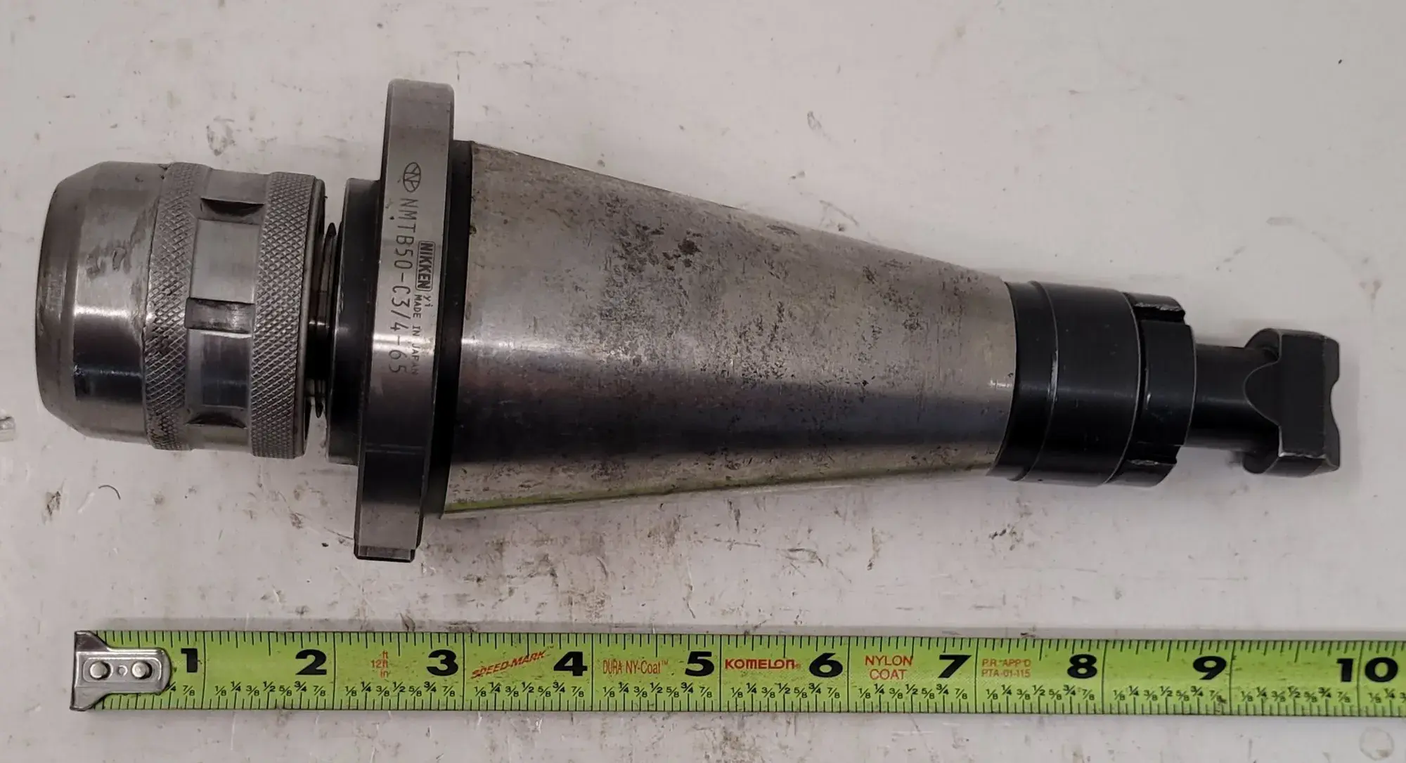 Nikken #NMTB50-C3/4-65, 50 taper collet chuck, 9.75" OAL, 2.75" projection, 1.32" hole