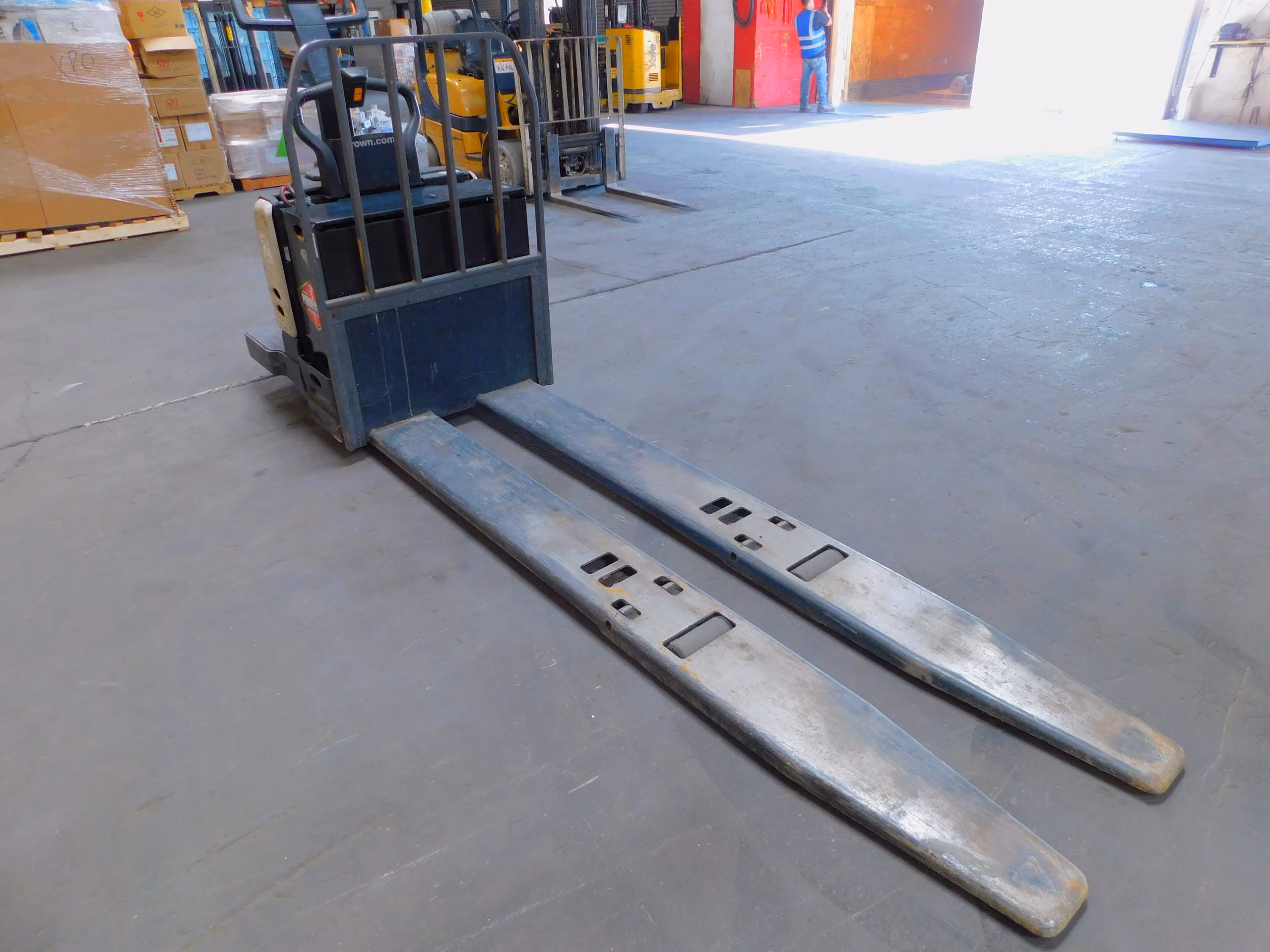 8000 lb. Crown #PE4500-80, electric rider pallet jack, 96" forks, 24 V., 5218 hours