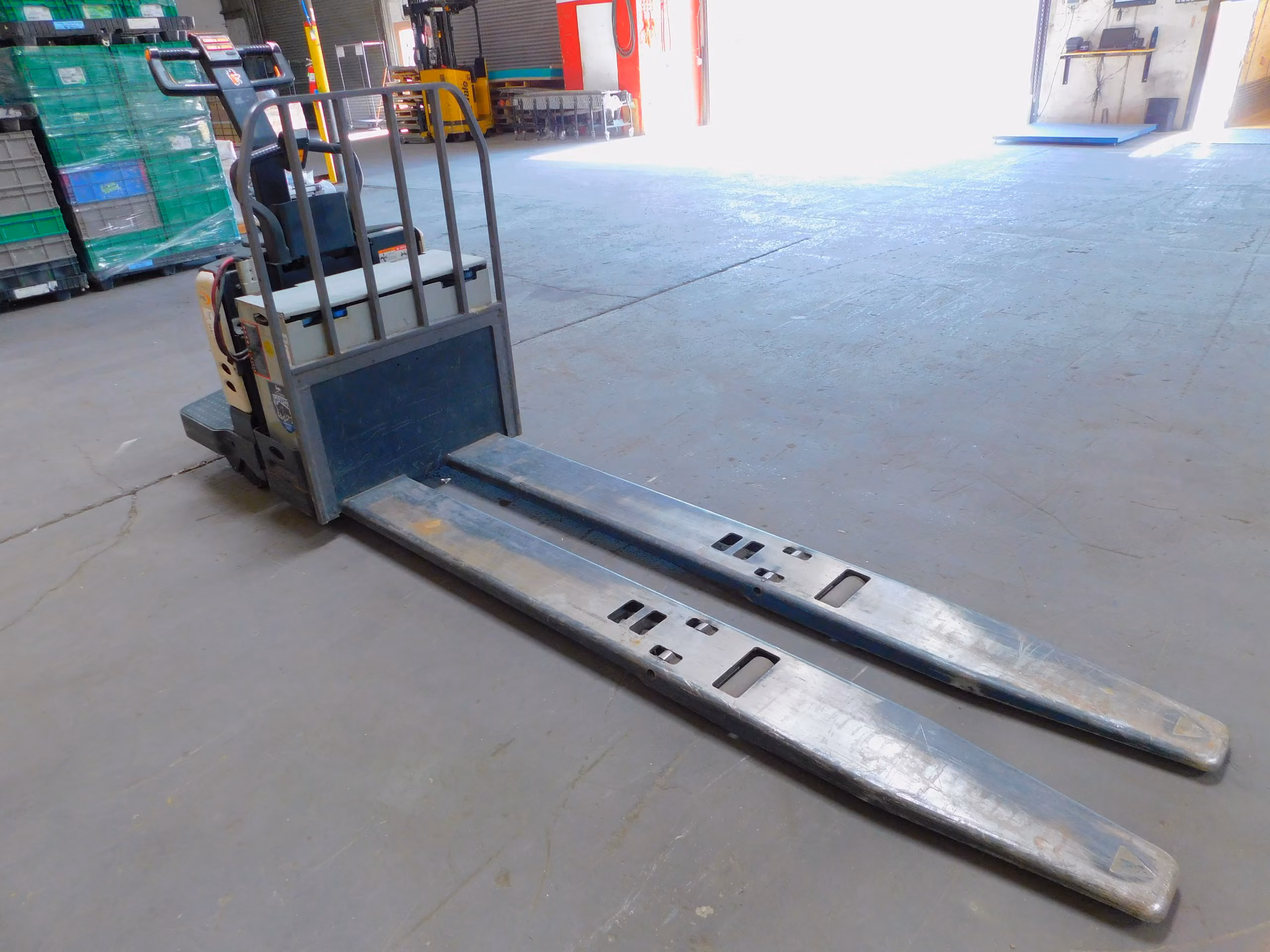 6000 lb. Crown #PE4500-60, electric rider pallet jack, 96" forks, 24 V.
