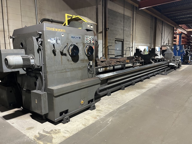 79" x 472" Poreba #TCG-200X12M, heavy duty lathe, 63" independent 4 jaw chuck, Newall 2-Axis digital read